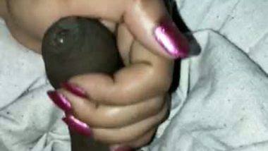 Desi Indian Bhabhi handjob in pink nails