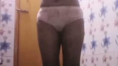 Bhabhi in bathroom baths and fingers cunt in horny mood