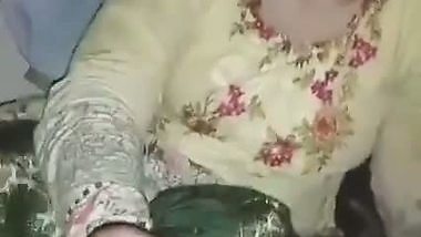 Karachi milf gives a handjob to her stepson in Pakistani sex
