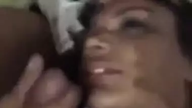 Sexy bitch eating cum from dick of her BF