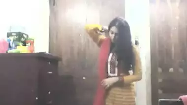 bengali girl in shalwar suit striping and trying dresses