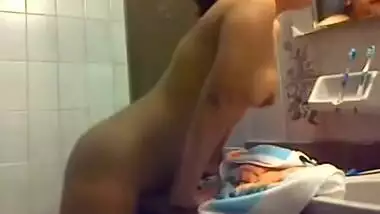 Horny Desi chick comes to the bathroom to masturbate after watching porn