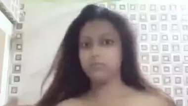 Sexy booby Bengali girl standing topless in bathroom