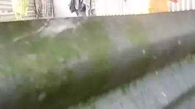 Neighbor Bengali aunty bathing outdoor caught on camera