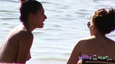 Topless Nineteen year old bathing in the sea
