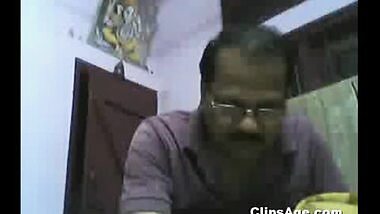 Bank manager working in Assam sucking boobs of his wife on webcam
