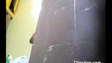 Tamil maid changing dress in her room captured using