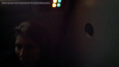 Gloryhole slut sucks cock in porn store video booth