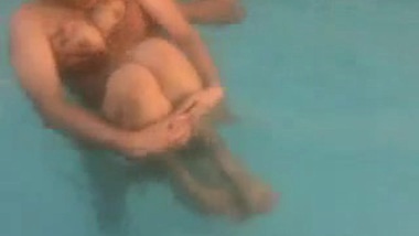 Desi girl enjoyed by her colleagues in pool.