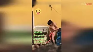 Horny Desi aunty fingering hairy pussy while bathing in a outdoor