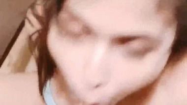 Horny babe masturbates and gives a desi blowjob to her lover