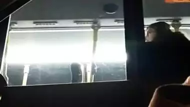 Cute Indian girl on bus pretends not to see my cock
