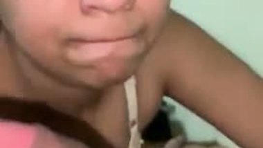 HD blowjob MMS of a half-nude girl sucking a thick dick