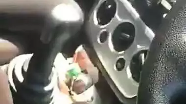 Cute girl sucking in car