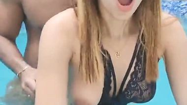 A couple enjoys Bangla outdoor sex in a swimming pool