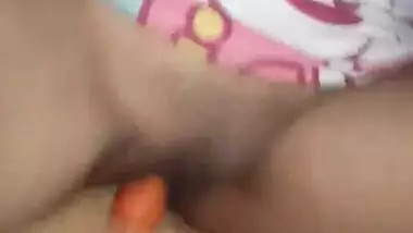 skinny girl masturbates with cucumber and carrot part 4