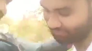 Indian outdoor sex of a guy sucking his GF’s tight boobs