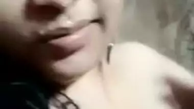 Indian girl showing boobs while bathing nude