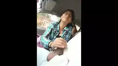 Indian porn mms of a slutty teen giving a blowjob to lover in his car