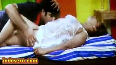 Indian older woman's boobs get licked with honey by young guy