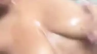 Booby Teen Spitting On Her Boobs