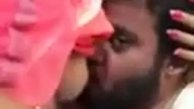 Indian wife letting her husband suck her boobs