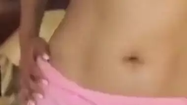 Sexy Desi woman takes XXX pink sari off exposing her sex appealing body