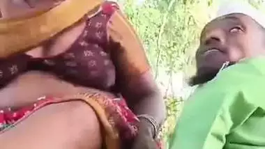 Outdoor sex of a handicapped man with a milf in the jungle