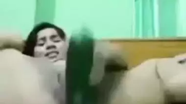 Indian girl masturbating with cucumber