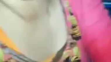 Female in a pink sari allows Indian man to touch her XXX boobs