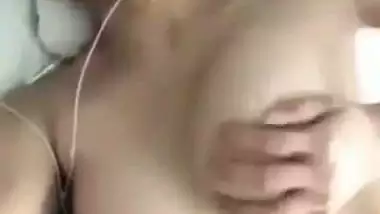 Indian nude girl shows her big, tight boobs in MMS