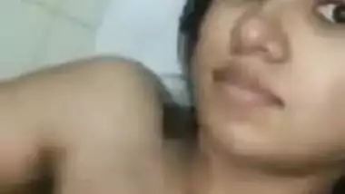 Desi XXX girl takes camera to film herself being topless in bathroom