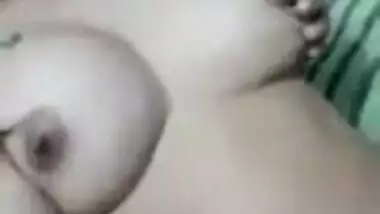 Hot Indian Teen plays with her Pussy