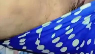 Bhabhi in glasses goes naked and fingers cunt