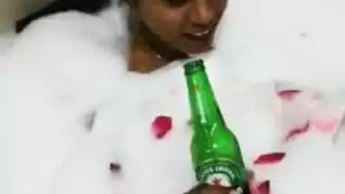 Attractive Desi chick enjoys beer and bubble bath in hot XXX video