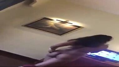 Young college girl stripping dance for client