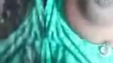 Desi mom in green sari gets partially naked in bed exposing breasts