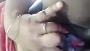 Big-tittied Desi hussy with huge breasts rubs her XXX pussy on cam