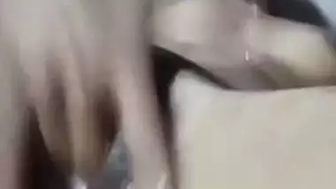 Nude Bangla girl sticks fingers into her juicy XXX cunt in Desi porn