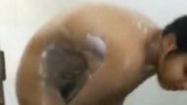 Cute Indian girl bathing