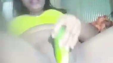 Naked Assamese girl fucks her pussy with a cucumber