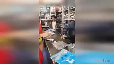 Lewd Desi aunty flashes her hairy pussy in the shop