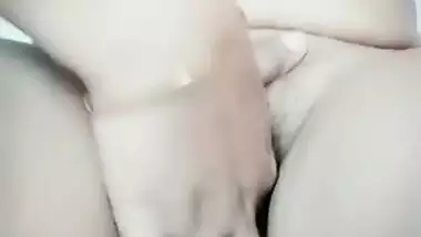 Pretty brunette spreads legs wide to XXX finger her wet Desi cunt