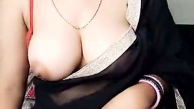 Sexy Bhabhi in See through Black Saree without blouse Exposing Boobs