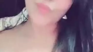 Indian sexy Actress Pressing Boobs and Showing Her Deep Cleavage