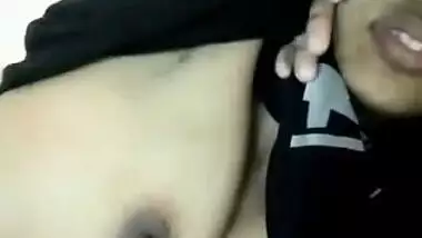 Young Indian woman with big sex eyes flashes her XXX tits in bed