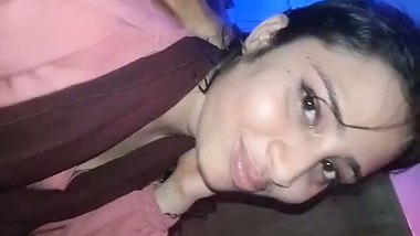 Shy girlfriend sucking dick of lover through pant zip open