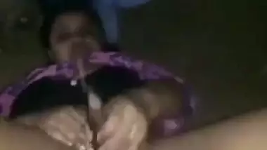 Nude desi lady fucks her hairy pussy with a brinjal