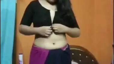 Cute girl stripping saree and showing naked boobs