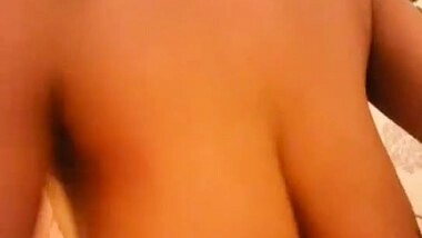 Indian bhabhi massaging her big and wet boobs